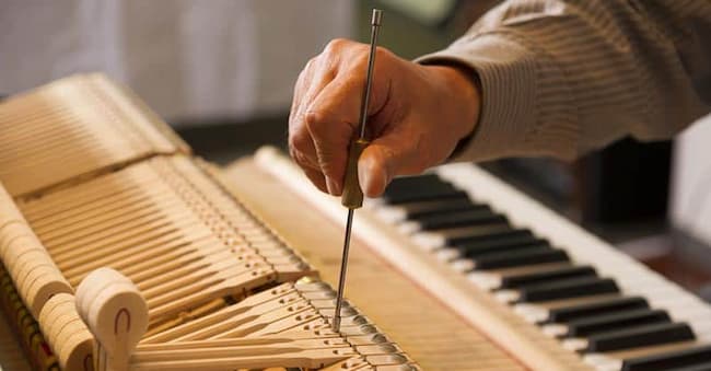 how much does it cost to tune a piano