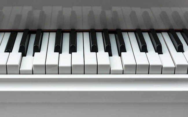 why do piano keys stick
